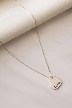 💎 Make her day with this dainty custom heart necklace! 🌟 Personalize it with an initial or name, and give the perfect gift for any occasion. A charming, minimalist piece she’ll treasure forever. 💖 #CustomJewelry #MinimalistNecklace #GiftForHer 🎀 Engraved Heart Necklace, Necklace For Her, Necklace Elegant, Jewelry Accessories Ideas, Silver Heart Necklace, Custom Name Necklace, Silver Engraving, Necklace Dainty, Necklace Personalized