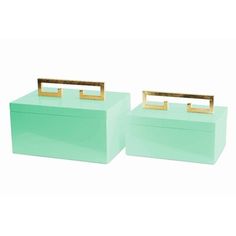 two mint green boxes with gold handles