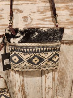 {Lightweight Canvas Purse} Introducing the Women's Classic Rug Canvas Leather Crossbody Bag - the perfect accessory for any fashion-savvy woman. This awesome bag is lightweight and features a vintage look with an ethnic rug pattern that will add charm to your vivacious personality. It's made of premium leather and high-quality canvas, so you can be sure it will last. {Perfect for Day or Weekend Trips} This spacious crossbody bag is perfect for school, work, and travel. The durable canvas and lea Vintage Zipper Pouch Bag, Vintage Everyday Zipper Pouch Bag, Bohemian Shoulder Bag With Cell Phone Pocket, Bohemian Pouch Shoulder Bag With Cell Phone Pocket, Bohemian Crossbody Shoulder Bag With Cell Phone Pocket, Bohemian Travel Bags With Zipper Pouch, Bohemian Clutch Shoulder Bag For Travel, Bohemian Style Clutch Shoulder Bag For Travel, Toile Rug