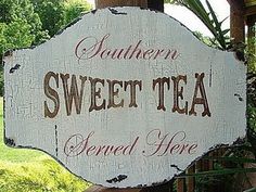 a sign that says southern sweet tea served here