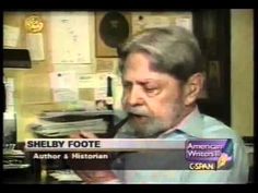 an old man sitting in front of a desk talking on a news program with the caption shelby foote author and historian