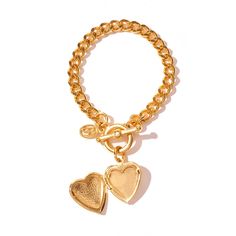 Gold link bracelet featuring open heart locket Vintage Gold Heart Bracelet As Gift, Vintage Gold Heart Bracelet For Gift, Gold Metal Heart Bracelet For Anniversary, Gold-tone Metal Jewelry With Heart Charm, Gold-tone Bracelets With Heart Charm As A Gift, Metal Bracelet With Toggle Clasp As Gift, Valentine's Day Gold Toggle Necklace, Elegant Metal Heart Bracelet With Toggle Clasp, Gold-tone Metal Toggle Necklace For Gift