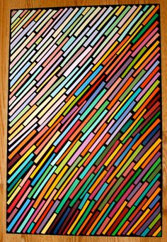 a wooden floor with colorful lines painted on it