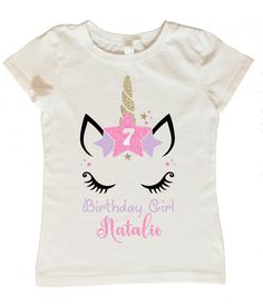 Dress up your little girl for her birthday with a personalized Unicorn birthday shirt! These shirts are 100% cotton and are created using heat pressed vinyl. This unicorn shirt is decorated with stars and is personalized with your child's name and age. We have the following sizes available: 2T 3T Youth XS (Equivalent to size 3/4) Youth S (Equivalent to size 6/6x) Youth M (Equivalent to size 7/8) Youth L (Equivalent to size 10/12) Youth XL (Equivalent to size 14/16) Personalization During checkou Cute Unicorn Print Birthday T-shirt, Pink Unicorn Print T-shirt For Birthday, Birthday Unicorn Print Crew Neck T-shirt, Birthday White T-shirt With Unicorn Print, White Unicorn Print T-shirt For Birthday, White Unicorn Print Top For Birthday, White T-shirt With Unicorn Print For Birthday, Cotton Unicorn Print Top For Birthday, Unicorn Birthday Shirt