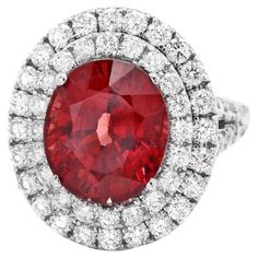 10.40 Carats Natural Red Zircon and Diamond 14K Solid White Gold Ring Total Natural Zircon Weight is: Approx. 8.40 Carats Zircon Measures: Approx. 12.00 x 10.00mm Natural Round Diamonds Weight: Approx. 2.00 Carats (color G-H / Clarity SI1-SI2) Ring size: 7 (free re-sizing available) Ring total weight: Approx. 8.4 grams Disclaimer: all weights, measurements and colors are approximate and may vary slightly from the listed dimensions or as seen in the image. All pictures are magnified to show the s Luxury Red Sapphire Ring With Center Stone, Red Diamond With Prong Setting, Red Diamond Gemstones With Prong Setting, Luxury Red Sapphire Ring, Formal Red Sapphire Ring, Red Round Halo Jewelry, Red Halo Lab-created Ruby Jewelry, Gia Certified Fine Jewelry Red Ruby Ring, Gia Certified Red Ruby Ring