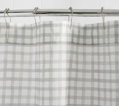 a white and grey checkered shower curtain