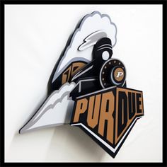 a black and white clock with the words purdue on it