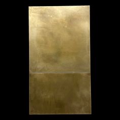 an abstract painting with gold paint and black background