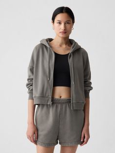 Soft cotton-blend slightly cropped hoodie.  Hooded neckline.  Long sleeves with banded cuffs.  Zipper front.  Banded hem.  * Fit: Over Sporty Gap Sweatshirt For Spring, Gap Sweatshirt For Spring Loungewear, Spring Gap Sweatshirt For Loungewear, Gap Spring Sweatshirt For Loungewear, Gap Spring Loungewear Sweatshirt, Gap Sporty Relaxed Fit Sweats, Gap Hoodie With Drawstring Hood In Relaxed Fit, Gap Hoodie With Drawstring Hood And Relaxed Fit, Sporty Hoodie With Soft Texture And Relaxed Fit