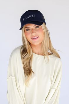 Calling all Braves fans, the Navy Atlanta Trucker Hat was made just for you! This cute hat is made of a soft cotton construction with a mesh back. It has a rounded top and a slightly rounded brim with "Atlanta" on the front! Adjustable Strap Spot Clean with Damp Cloth or Sponge One Size Fits Most Casual Flat Brim Trucker Hat For Fan Gear, Fan Gear Visor Hat, One Size Fits Most, Spring Soft-washed Curved Bill Hats, Casual Baseball Cap With Flat Brim For Fans, Casual Baseball Cap For Fan Gear With Flat Brim, Flat Brim Trucker Hat For Fan Gear, Game Day Baseball Cap One Size, Trucker Hat With Visor For Baseball Season, Trucker Hat Visor For Baseball Season