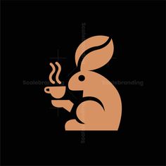 a rabbit holding a cup of coffee with its nose in the shape of a bunny