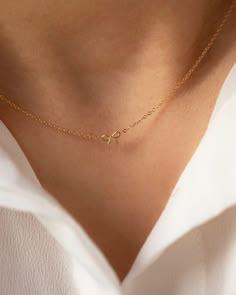 14k gold dainty bow necklace  Small, petite bow makes it perfect for everyday necklace. * 14k Yellow Gold * Bow measures about 6mm Same style bracelet: https://www.etsy.com/listing/1613477197/14k-mini-bow-bracelet-dainty-ribbon-bow?click_key=3f15f81be1d453ba05d6e2a4491c8d3fcad90b9e%3A1613477197&click_sum=8d2f380f&ref=shop_home_active_1&frs=1&sts=1 ■ OUR POLICIES https://www.etsy.com/shop/EandEProject/policy?ref=shopinfo_policies_leftnav ■ VISIT OUR ETSY SHOP www.eandeproject.etsy.com ■ MESSAGE U Gold Dainty Bow Jewelry, Dainty Gold Jewelry With Bow Detail, Delicate Butterfly Knot Jewelry As Gift, Delicate Butterfly Knot Jewelry For Gifts, Delicate Bow Jewelry As Gift, Delicate Bow Jewelry For Gifts, Delicate Bow Jewelry For Gift, Dainty Bow Necklace For Gift, Dainty Bow Necklace For Gifts