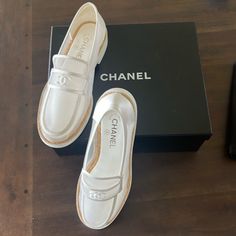 White Mesh And Satin Chanel Loafers. Never Worn, Size 40 Elegant Patent Leather Platform Loafers For Spring, Luxury Slip-ons With Brogue Detailing And Round Toe, Luxury Summer Loafers With Flat Heel, Chic White Almond Toe Slip-ons, Designer Round Toe Loafers For Spring, Elegant Spring Patent Leather Platform Loafers, White Platform Loafers For Formal Occasions With Almond Toe, White Platform Loafers With Almond Toe For Formal Occasions, Modern White Platform Loafers For Formal Occasion