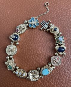 Sold as is! Enamel loss, but charms are really cool! Fine Jewelry Bracelets, Charm Bracelets, Jewelry Watches, Jewelry Bracelets, Fine Jewelry, Charm Bracelet, Charms, Bracelet, Jewellery Bracelets