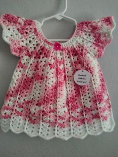 Handmade dress. size 2T.  Please ask seller for exact measurements. Handmade Fitted Pink Dress, Cute Handmade Pink Dress, Handmade Pink Dress For Spring, Handmade Pink Dresses For Spring, Cute Handmade White Dresses, Handmade Cute White Dresses, Handmade Pink Cotton Dress, Baby Girls Dresses, Handmade Dress