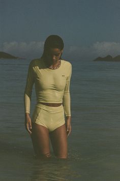 The Poppler is our new long sleeve rash-guard top. A second-skin, full-coverage silhouette that is perfect for roaming the ocean while being protected from the sun.This is a doubble layer cropped top, with U shaped scooped neck. Throw it on, on top of your favorite bikini set, or pair it with our matching bottoms. Cropped Rashguard U scooped neck Long sleeve Single layer Dry Fast and UV protective Chlorine resistant Sydney is wearing S Sun Protection Clothing Woman, Rashguard Outfit, Rash Guard Women Swimwear, Rashguard Women, Surfing Swimsuit, Coverage Swimsuit, Surf Style Clothes, Ocean Sports, Upf Clothing