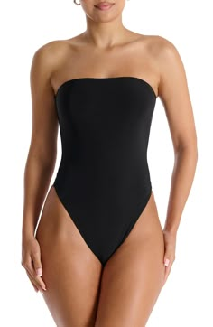 Give your next look a smooth foundation with this stretchy bodysuit boasting a strapless design. 23" length (size Small) Pull-on style Strapless 95% polyester, 5% spandex Hand wash, line dry Imported Strapless Bodysuit Outfit, Strapless Black Bodysuit For Club, Black Strapless Stretch Bodysuit, Solid Strapless Smoothing Bodysuit, Black Bandeau Stretch Bodysuit, Black Underwire Second-skin Bodysuit, Black Bodysuit Outfit, Fitted Bodysuit, Black Body Suit