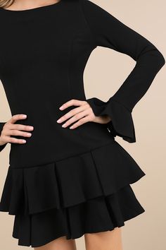 Turn cocktail hour into cutie hour with the Lulus Immaculate Essence Black Tiered Drop Waist Mini Dress! This stretchy crepe knit dress features a crew neckline, long sleeves with flaring cuffs, and a princess-seam details that accent the figure-flaunting silhouette. A trendy drop waist tops a tiered skirt that finishes at a flirty mini hem. Hidden back zipper/clasp. Fit: This garment runs small - please size up. Length: Above mid-thigh. Size medium measures 33.75" from shoulder to hem. Bust: Great for any cup size. Waist: Fitted - stretchy fabric allows custom fit. Hip: Fitted - stretchy fabric allows room for hips. Undergarments: May be worn with any standard bra. Fabric: Fabric is very stretchy. Lined. Shell: 95% Polyester, 5% Spandex. Lining: 100% Polyester. Hand Wash Cold. Do Not Blea Drop Waist Dress, Dropwaist Dress, Princess Seam, Tiered Skirt, Cocktail Hour, Waist Dress, Drop Waist, Cup Size, Stretchy Fabric