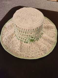 This is a crocheted floppy sun hat and matching small bag.  The hat has a draw string to loosen or tighten.  The hat will fit in the bag or the bag can be used for phone, wallet, change etc. Beach Hat With Crochet Lace And Adjustable Fit, Beach Hat With Adjustable Crochet Lace, Summer Beach Hats With Crochet Lace, Summer Beach Hat With Crochet Lace, Crochet Lace Hats For Summer Beach, Crochet Lace Summer Beach Hats, Beach Crochet Hat Made Of Yarn, Summer Beach Crochet Lace Hats, Casual Crochet Lace Hat For The Beach