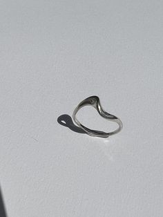 Handmade sterling silver ring. Abstract wave dramatic ring. It sits perfectly on to my wave band. This can be custom made in any size I-R. Minimalist Sterling Silver Wavy Ring, Modern Silver Wavy Rings, Adjustable Silver Wavy Rings, Adjustable Sterling Silver Wavy Rings, Sterling Silver Wavy Promise Ring, Wavy Silver Promise Ring, Sterling Silver Promise Ring With Wavy Shape, Handmade Sterling Silver Rings, Abstract Waves