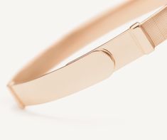 Sophisticated and linear in design, this bangle in 18K rose gold is carefully handcrafted with the brand’s exclusive coil technique. Perfect on its own and stunning stacked with the other bangles in the collection, it is super easy to slip on and off thanks to the new integrated clasp. Please see size guide for reference. Modern Rose Gold Bangle Bracelet, Elegant Stackable Rose Gold Bracelet, Modern Rose Gold Bangle For Formal Occasions, Modern Rose Gold Bangle For Formal Events, Rose Gold Stackable Bangle Bracelet, Elegant Stackable Rose Gold Bangle, Luxury Flexible Bangle, Modern Rose Gold Cuff Bangle Bracelet, Adjustable Modern Rose Gold Bangle