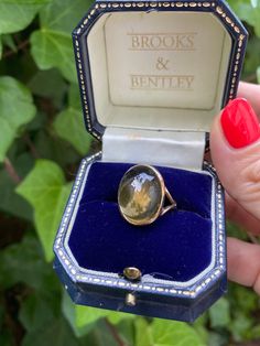 Gorgeous statement ring, 9ct gold cabochon citrine, UK size O, US size 7.25. The stone measures approx 2cm x 1.5cm. Gold Topaz Oval Cabochon Ring As Gift, Gold Oval Cabochon Topaz Ring Gift, Gold Oval Cabochon Topaz Ring, Yellow Gold Sapphire Cabochon Ring, Gold Dome Cabochon Ring In 14k Gold, Gold Oval Cabochon Topaz Ring For Anniversary, Vintage Gold Sapphire Cabochon Ring, Gold Vintage Sapphire Cabochon Ring, Vintage Gold Sapphire Ring With Cabochon