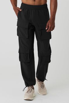 Up your game with the Cargo Venture Pant. It has awesome functionality—think all-over pockets, interior drawcords, and custom cinching at hem—plus, a water-repellent finish. From workout to wear out, it’s a winner. Front & back cargo pockets; invisible zip side pockets Interior drawcords Bungee detail at hem for custom cinching Designed & uniquely fit to flatter every size Wear-tested by our in-house team for the perfect fit Womens Onesie, Tank Top Bras, Clothing Pants, Yoga Clothing, Womens Capris, Back Women, Womens Wellness, Invisible Zip, Alo Yoga