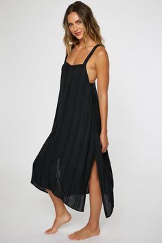 Essential midi cover-up dress that has a solid color design, self-adjusting straps and flowy fit. O'Neill Women's midi cover-up dress 37 3/4" In length Self adjusting straps Flowy fit Center back seam Solid color wash 100% Viscose Black Sleeveless Maxi Dress With Tie Straps, Sleeveless Black Maxi Dress With Tie Straps, Solid Color Slip Dress With Adjustable Straps For Spring, Slip Dress With Adjustable Straps For Vacation, Solid Slip Dress With Adjustable Straps For Spring, Black Spaghetti Strap Dress For Beach Season, Spaghetti Strap Slip Dress For Beach, Chic Solid Color Slip Dress For The Beach, Casual Black Maxi Dress With Adjustable Straps