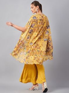 Please check the last image for a detailed size chart This co-ords consists of tunic and palazzos Yellow floral printed tunic, has round neck, flared sleeves Yellow solid mid-rise palazzos have slip-on closure and flared hem Material & Care Polyester Hand Wash/Dry Clean Pattern: Embroidered, Floral Print Style: Co-ord Set, Wedding Guest Outfit Dispatch within 7 days Flared Palazzo, Kaftan Tunic, Indian Suits, Print Style, Co Ord Set, Co Ords, Guest Outfit, Western Outfits, Co Ord