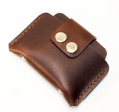 "Leather credit card wallet! Very comfortable & easy to wear. Color:brown. Size: 8 x 12 cm. It has 3 interior sleeves holds Nearly 12 cards , also Suitable for holding some cash. And it also can be used as a business card holder . This wallet created from hight quality \"Crazy horse leather\"! Crazy horse leathers are made by applying a special kind of wax to a full grain leather surface that has been buffed and smoothed out. The type of wax used rests independently upon the leather fibers a Brown Pouch With Cell Phone Pocket For Everyday Carry, Brown Trifold Wallet With Card Slots For Everyday Use, Brown Trifold Wallet With Cell Phone Pocket, Brown Pouch Wallet With Interior Card Slots, Brown Leather Card Holder With Cell Phone Pocket, Brown Wallet With Interior Card Slots, Brown Pouch With Cell Phone Pocket As Gift, Brown Card Holder With Card Slots For Everyday Carry, Brown Wallet With Belt Clip For Everyday Carry