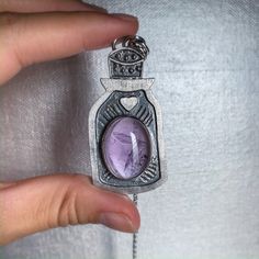 Amethyst necklace, potion bottle necklace, amethyst pendant, amethyst jewelry, fabricated pendant, sterling silver, ooak crystal necklace by ZebaJewelry on Etsy https://www.etsy.com/listing/763222488/amethyst-necklace-potion-bottle-necklace Potion Bottle Necklace, Necklace Amethyst, Bottle Necklace, Potion Bottle, Amethyst Jewelry, Amethyst Necklace, Amethyst Pendant, February Birth Stone, Birthstone Jewelry