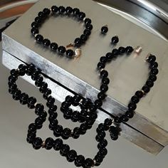 14k Yellow Gold & 7mm Black Onyx Bead 3 Piece Set Excellent Pre-Loved Condition - Like New Vtg 1990s, Classic Style 24" Neckace - Hand Knotted - 7mm Genuine Black Onyx Beads, High Polish Finish - 11 14k Gold Beads Spaced Evenly Between The Black Onyx - Large Textured 14k Gold Safety Clasp - Marked 14k - There Is A Makers Mark Clearly Visible In The 5th Pic Along With 14k Mark - I Am Researching. 7 1/2" Bracelet - Hand Knotted - 7mm Genuine Black Onyx Beads - 3 14k Gold Beads Spaced Evenly Betwee Luxury Onyx Jewelry With Black Beads, Black Onyx 8mm Bead Jewelry, Gold Onyx Bracelets With 8mm Beads, Classic Hallmarked Onyx Jewelry, Luxury 8mm Onyx Beads Jewelry, Onyx Bead, Gold Beads, Black Onyx, Post Earrings