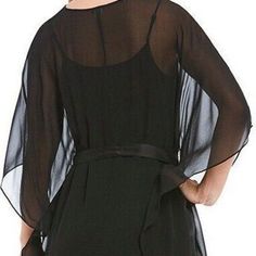 The Perfect Dress For This Season's Social Calendar Is The Epitome Of Flowy Ease And Elegance In A Loosely Structured, Fluttering Cut Of Sheer Stretch-Silk Wrapped With A Satin Ribbon Belt. - 38 1/2" Length Slips On Over Head - V-Neck - Three-Quarter Sleeves - Removable Tie Belt - Stretch-Silk Slip Lining - 91% Silk, 9% Spandex - Dry Clean - Imported - Individualist Care Machine Wash Chic Silk V-neck Kaftan, Black Cape Sleeve Dresses For Spring, Black Dresses With Cape Sleeves For Spring, Chic Black V-neck Kaftan, Black Spring Evening Kaftan, Black Spring Kaftan For Evening Wear, Elegant Chiffon Kaftan For Spring, Sheer Silk V-neck Dress, Black Silk Dress With Sheer Sleeves