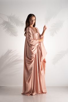 "Elevate your style with our Ethereal Blush Blossom Abaya, a masterpiece of extravagant design. This opulent abaya dress is a vision of beauty, featuring intricate floral embroidery that dances across a delicate blush canvas. Its flowing silhouette evokes a sense of regal grace and timeless elegance, making it perfect for the most lavish occasions. The Ethereal Blush Blossom Abaya is a true statement piece, a symbol of refined luxury that captures the essence of feminine allure and sophisticatio Evening Dress Plus Size, Dress Ethereal, Cocktail Rose, Blush Cocktail Dress, Formal Maxi Dress, Ethereal Dress, Kaftan Abaya, Dress Wedding Guest, Abaya Dress