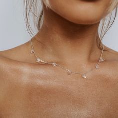 Illuminate your style with our dainty Herkimer diamond necklace, featuring seven delicately spaced Herkimer diamonds that dangle and catch the light with every movement. Each crystal is known for its natural brilliance, adding a touch of ethereal sparkle to your look. Available in Solid Sterling Silver and 14ct Gold Filled, this necklace is a versatile piece that complements any outfit, from everyday ensembles to more formal occasions. The shimmering Herkimer diamonds create a captivating displa Delicate Chain Cubic Zirconia Backdrop Necklace As A Gift, Delicate Diamond Necklace With Adjustable Chain For Wedding, Dainty Cubic Zirconia Backdrop Necklace Gift, Dainty Sparkling Necklace For Party, Dainty Cubic Zirconia Backdrop Necklace For Gift, Minimalist Sparkling Jewelry For Wedding, Delicate Sterling Silver Solitaire Necklace, Delicate Sterling Silver Diamond Necklace For Wedding, Delicate Diamond Necklace For Wedding