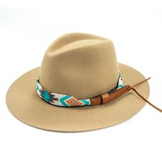 Price includes a Lola Sambboho hat & an Aztec Flat hatband. Save 10% with this bundle. Select hat size. Hatband is one size fits all. Hatband is removable.  An iconic must-have Fedora hat that will never get out of fashion. Sambboho's Lola hat has a soft brim and indented crown. A chic piece to be worn at all seaso Cheap Brown Hat Bands For Festivals, Adjustable Southwestern Straw Hat For Festivals, Southwestern Adjustable Straw Hat For Festivals, Southwestern Style Adjustable Straw Hat For Festival, Bohemian Beige Panama Hat For Outdoor, Beige Bohemian Panama Hat For Outdoor, Adjustable Fedora For Rodeo, Adjustable Beige Bucket Hat, Southwestern Adjustable Hat Bands For Beach