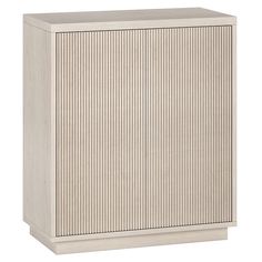 a white cabinet with vertical stripes on it