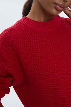 Mockneck long sleeve sweater with wide ribbed cuffs and collar. Crafted from a marled, waffle knit with directional knitting and dropped shoulders for a relaxed fit and transitional wearability. Ruby is a vibrant red colorway perfectly suited for statement styling. 100% Cotton Imported Modern Winter Sweater With Ribbed Cuffs, Textured Knit Funnel Neck Sweater For Work, Oversized Knit Cropped Sweater With Ribbed Collar, Modern Turtleneck Sweater With Ribbed Cuffs, Workwear Textured Knit Sweater With Funnel Neck, Oversized Knit Polo Sweater With Ribbed Cuffs, Modern Ribbed Collar Sweater For Fall, Funnel Neck Sweater With Ribbed Cuffs For Work, Modern Ribbed Long Sleeve Sweater