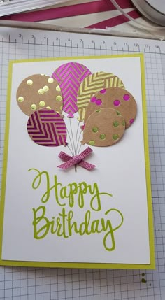 a birthday card with some balloons on it