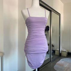 A Tight Bodycon Dress To Bring Out Your Body Shape. It’s Stretchy Too. Ships In 3 Days Text Me If You Have Any Questions #Ruched #Bodycon #Purple #Pastel #Cute Purple Ruched Bodycon Summer Dress, Purple Fitted Bodycon Dress With Spaghetti Straps, Chic Fitted Purple Mini Dress, Purple Mini Length Bodycon Dress, Purple Stretch Mini Bodycon Dress, Fitted Purple Mini Dress, Purple Bodycon Mini Dress, Purple Spaghetti Strap Bodycon Dress For Date Night, Trendy Purple Stretch Mini Dress