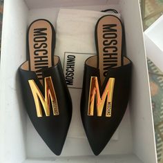 A Goldtone Logo Plaque Detail These Leather-Made Mules. Leather Upper Point Toe Slip-On Style Leather Lining Leather Sole Made In Italy Size Heel, 0.37" (9mm) Moschino Shoes, Formal Shoes, Moschino, Women's Shoes Sandals, Shoes Sandals, Leather Upper, Gold Tones, Villa, Slip On