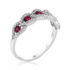 Ross-Simons - .50ct t. w. Ruby, .23ct t. w. Diamond Band Ring in 18kt White Gold. Size 7. Flaunting a fabulous fusion of sparkle and color, this band ring presents five radiant .50 ct. t. w. round rubies inside luminous .23 ct. t. w. round brilliant-cut diamond halos. Crafted in 18kt white gold. 3/16" wide. Diamond and ruby band ring. Ruby birthstones are the perfect gift for July birthdays. Diamond White Ruby Ring With Diamond Accents, Formal Ruby Ring With Pave Setting And Round Cut, Ruby Ring With Pave Setting And Diamond, Ruby Ring With Diamond Pavé Setting, Elegant Ruby Ring With Pave Setting For Anniversary, Brilliant Cut Cubic Zirconia Ruby Ring For Anniversary, Formal Ruby Ring With Diamond Accents And Round Cut, Dazzling White Gold Ruby Ring With Diamond Accents, White Gold Ruby Ring With Pave Setting