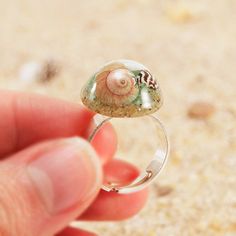 This is a real seashells ring from my sand jewelry collection. A unique terrarium ring, an original mermaid ring as the most beautiful mermaid gift for women. This real seashells ring is perfect to have the ocean always in your hand. Sand jewelry will give an original and natural touch to your hands. Real seashells jewelry from my resin jewelry collection that will never make you go unnoticed! The high-gloss crystalline resin privides this real seashells ring with a delicate crystalline shine. T Ocean-inspired Shell Rings For Beach, Ocean-inspired Shell-shaped Rings As Gift, Unique Beach Jewelry, Handmade Shell Ring For Beach, Handmade Ocean-inspired Rings, Unique Shell Jewelry For Gifts, Unique Shell Jewelry Gift, Ocean-inspired Shell-shaped Jewelry Gift, Unique Shell Jewelry As A Gift