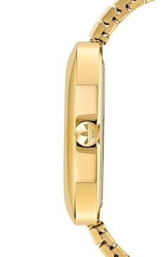 A golden case and matching bracelet create a clean, monochromatic style for this Trefoil-detailed watch marked by stick indexes on a wide, easy-to-read dial. Deployant clasp closure Quartz movement Stainless steel with goldtone ionic plate Imported Classic Gold Watch With Rectangular Dial, Yellow Gold Analog Watch With Rectangular Dial, Yellow Gold Analog Watches With Rectangular Dial, Gold Watches With Rectangular Metal Dial, Timeless Gold Watch Accessories With Rectangular Dial, Yellow Gold Watches With Rectangular Dial, Elegant Gold Watch With Analog Display, Gold-tone Quartz Watch For Formal Occasions, Elegant Gold Watches With Analog Display