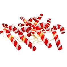 red and white candy canes with lights on them