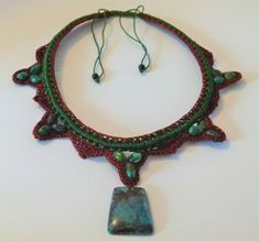 For your consideration is the pictured item a NEW Handmade Crocheted Artisan Necklace Choker Genuine Gemstones-  Chrysocolla Adjusts to fit anyone. Just use the beads...The pendant measures 1 1/2 x 1 1/4 inches.  Please note that I do not accept returns. Ask questions and look carefully at the pictures. I combine items for shipping and will refund over payment of shipping on multiple items. Thanks for looking! Free shipping applies to US only. Handmade Earthy Turquoise Necklace For Gift, Handmade Bohemian Turquoise Chrysocolla Necklace, Turquoise Beaded Nature-inspired Jewelry, Nature-inspired Beaded Turquoise Jewelry, Adjustable Nature-inspired Stone Necklace, Earthy Chrysocolla Jewelry Gift, Nature-inspired Turquoise Beaded Jewelry, Handmade Adjustable Turquoise Necklace As Gift, Adjustable Nature-inspired Jewelry With Stones