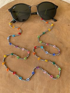 80 cm long sunglasses chain  Colorful beaded handmade Handmade Glass Beaded Necklaces For Summer, Glasses Chain Diy, Daisy Glasses, Beaded Sunglasses Chain, Flower Glasses, Beaded Glasses Chain, Rainbow Daisy, Beaded Sunglasses, Handmade Sunglasses