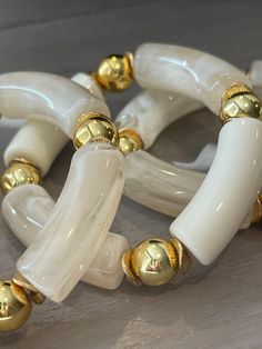 "These fun chunky bracelets are made with neutral marbled and ivory acrylic tube beads. They have gold plated beads and spacers in between. Two are the neutral marbled and two are mixed with the ivory.  All of my bracelets are made for a 7\" (give or take) wrist. They are great to stack and mix with your own jewelry. I do advise to put them on and off gently. Do not stretch them out or yank them. They are stretch bracelets and so versatile! Check out my shop for more colors and styles!   They ar Clothespin Diy Crafts, Spring Jewelry Trends, Summer Jewelry Trends, Acrylic Tube, Spring Bracelet, Trending Bracelets, Winter Jewelry, Handmade Christmas Gifts, Holiday Jewelry