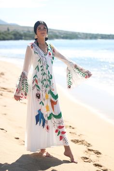 "Beach Wedding Kaftan, Beach Cover Up, Summer Wedding Kaftan So you're off to the beach and you don't want to be caught out by forgetting those essential items! How can you be sure you have everything you need? Well we think you are missing one thing. Try out this long sleeved white beach Dress - it will help you to stay cool on those long hot days on the sand, and it's a garment you can wear anytime, anywhere. The dress comes fully Lined. Fit for beach weddings, lounging in a resort or just abo White Long Gown For Spring, Traditional Summer Wedding Kaftan, Bohemian Summer Dresses For Honeymoon, Flowy Floor-length Beach Gown, Floral Embroidered Flowy Maxi Dress For Wedding, Flowy Maxi Dress With Floral Embroidery For Wedding, Summer Wedding Kaftan With Floral Embroidery, Summer Wedding Floral Embroidered Kaftan, Bohemian Maxi Beach Gown