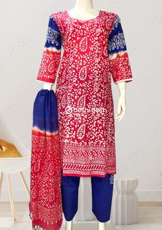 Featuring everyday use soft design 3 pieces batik printed cotton salwar kameez suit. Batik print on Soft Cotton Fabric. Batik printed cotton trouser salwar. Batik printed soft cotton dupatta. Color: There might be slight color variation due to lightings and flashes while photo shooting. The color may also vary because of different screen resolutions. Wash Care: Wash With Cold Water. Multicolor Cotton Unstitched Suit With Long Sleeves, Unstitched Chanderi Lawn Suit With Block Print, Long Sleeve Cotton Churidar With Bandhani Print, Red Printed Traditional Unstitched Suit, Red Traditional Printed Unstitched Suit, Traditional Red Printed Unstitched Suit, Cotton Long Sleeve Churidar With Block Print, Bohemian Cotton Unstitched Suit For Eid, Long Sleeve Cotton Churidar With Block Print